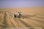 1987/88_ALGERIA_SAHARA_on one hand dangerous crossing ... alone ...nearly the end ... but on the other hand funny, because I couldn�t move the motorbike straight on in that very deep, very soft SAHARA-sand, I came with much power and the motorcycle suddenly moved around and dug in ... as if by magic_close to that place I had a bad accident some months before_fracture of my collarbone and four ribs, was found by some french photographers and their models and was transported to the oasis 'In Salah' (hospital), leaving back my motorcycle