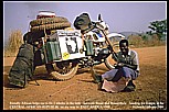 1987/88_Central African Republic_friendly African helped me to fix 3 holes in the tank_between Bouar and Bossembele_heading for Bangui_Jochen A. H�bener
