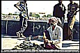 1995_INDIA_BOMBAY (Mumbai)_be careful_a snake charmer with some cobras_my motorcycle-trip around the world_Jochen A. H�bener